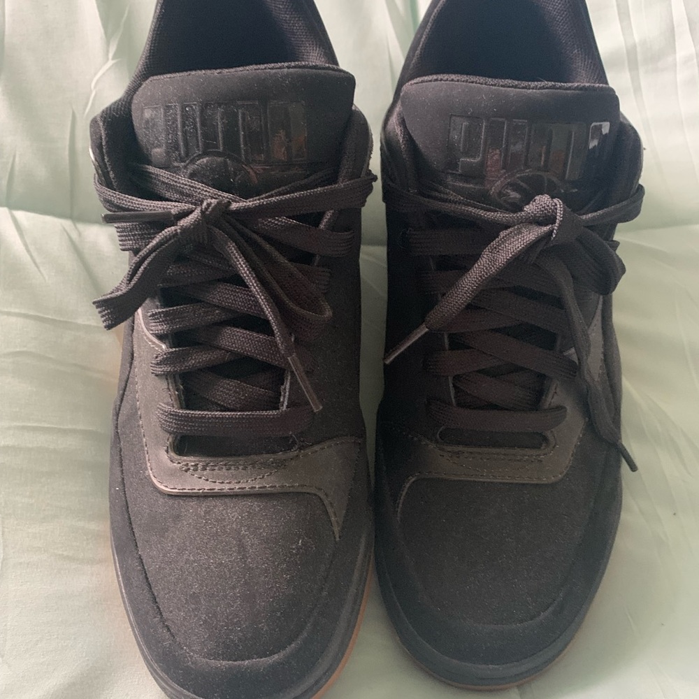 Black high top Puma sneakers